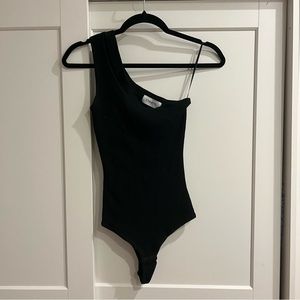 Black one shoulder body suit